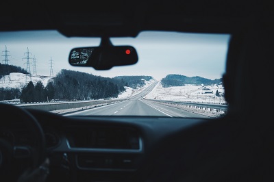 image of car driving in winter